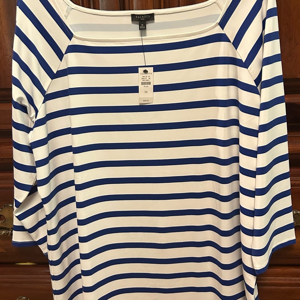 Royal blue striped 3/4 sleeve top with square neck and raglan sleeves.